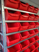 Steel Shelving Unit with Red Bins Close Up